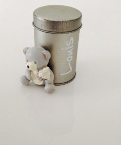 Ours aimanté sur boite métallique cylindrique