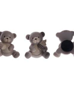 Alternative view of Ours aimanté sur boite métallique cylindrique